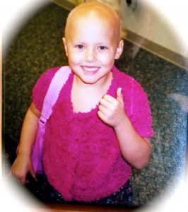 Hope High School Online staff member Elizabeth as a child with leukemia