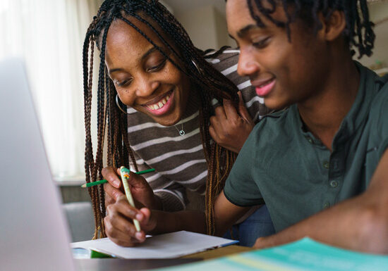 two people working on school work